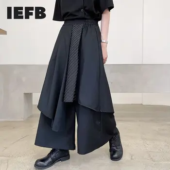 IEFB Japan Sstreetwear Mode voor Mannen een Zwarte Broek 2023 Nieuwe Streep Contrast Kleur Patchwork Onregelmatige Losse Enkel Lengte Broek